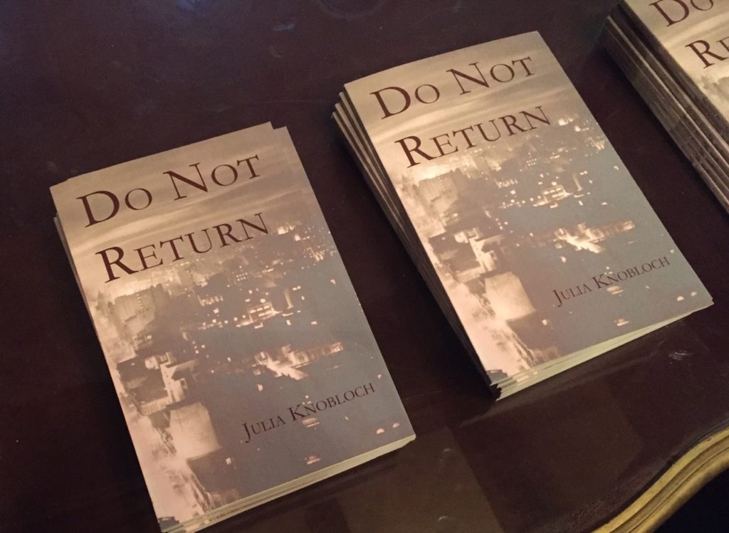 copies of Julia Knobloch's poetry collection DO NOT RETURN